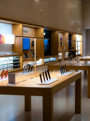 Sleek interior of a high-tech store showcasing various mobile devices and accessories.